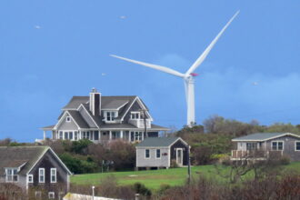 Deepwater Wind, regulated by the Rhode Island Public Utilities Commission, was the nation's first offshore wind farm, as seen from Block Island. Credit: Mark Harrington/Newsday RM via Getty Images.