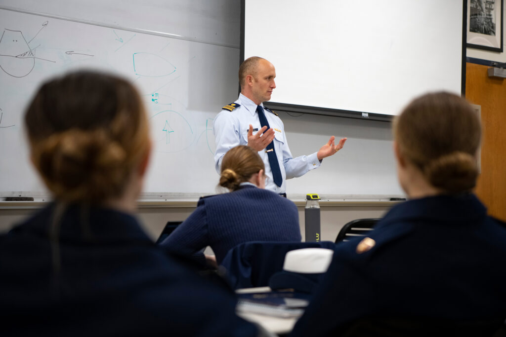 Cadets attend a class at the U.S. Coast Guard Academy in March 2020. Credit: Matthew Thieme/U.S. Coast Guard