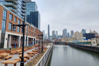 A new apartment complex is under construction along the Gowanus Canal at Degraw and Sackett streets, one of the latest projects tied to the Brooklyn neighborhood’s rezoning. Credit: Jordan Gass-Pooré/Inside Climate News