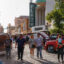 People stroll down Hidalgo Street to take a look at classic cars during the third annual Estos Vatos BorderTown Getdown car show in downtown Laredo on Saturday evening, March 22, 2025. Credit: Sam Owens/San Antonio Express-News
