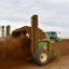 A tractor pulls a machine for composting cow manure at a dairy farm in Fort Morgan, Colo. Credit: Hyoung Chang/The Denver Post via Getty Images