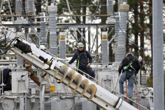 A crew works on a Duke Energy substation in Carthage, N.C. Credit: Peter Zay/Anadolu Agency via Getty Images