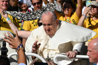 Pope Francis arrives for the welcoming ceremony of a World Youth Day gathering in Lisbon, where he urged young Catholics to focus on caring for the planet and fighting climate change, on Aug. 3, 2023. Credit: Marco Bertorello/AFP via Getty Images