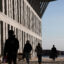 Students walk through the campus of UMass Boston. Credit: Suzanne Kreiter/The Boston Globe via Getty Images