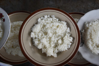 A package of white rice serves as a seafood sambal dish at a food stall in Malang, East Java, Indonesia, on January 16, 2025. Credit: Aman Rochman/NurPhoto/Getty Images