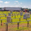 Boxes of solar panels await installation at a solar farm construction site on June 24, 2024, in Albion, Mich. Credit: Jim West/UCG/Universal Images Group via Getty Images