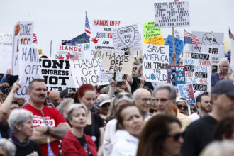 People and their signs fill the frame