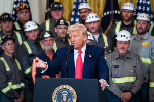 President Donald Trump speaks alongside coal miners before signing executive orders about coal production at the White House on April 8 in Washington, D.C. Credit: Jabin Botsford/The Washington Post via Getty Images