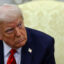 President Donald Trump listens to reporters’ questions in the Oval Office at the White House on Thursday. Credit: Win McNamee/Getty Images