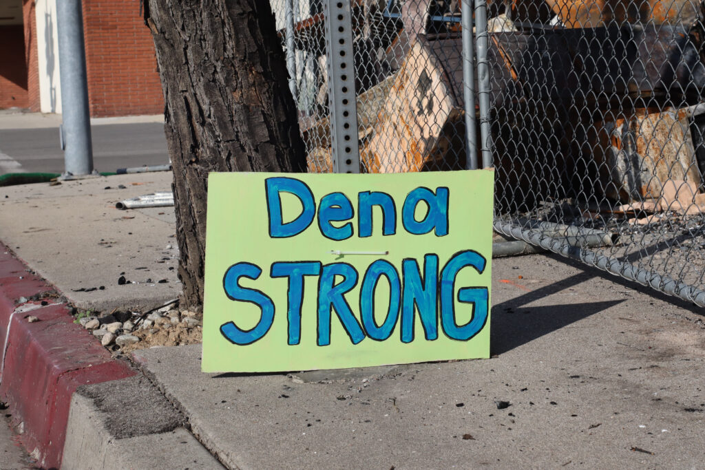 A sign of encouragement stands on a tree in downtown Altadena. Credit: Rambo Talabong/Inside Climate News