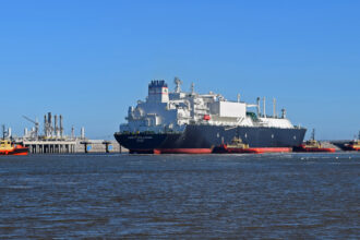 Energy Intelligence, a liquefied natural gas tanker, docks at Venture Global's Calcasieu Pass LNG export terminal in Cameron, La. on Feb. 26 to refill its cargo holds before departing for Eemshaven in the Netherlands. Credit: Phil McKenna/Inside Climate News