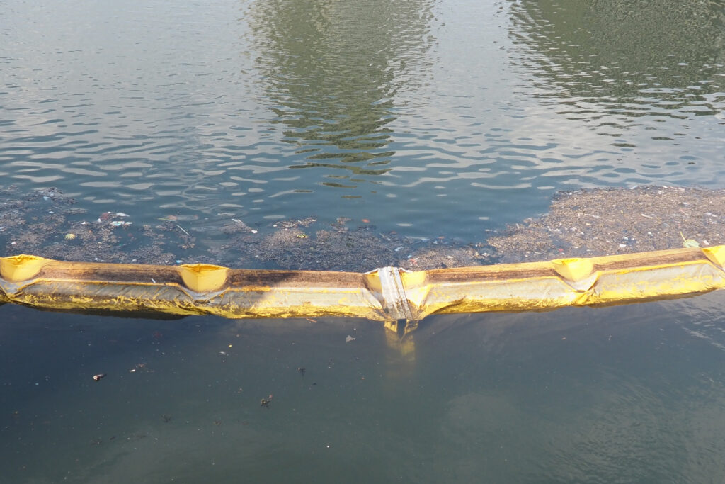 The Gowanus Canal, known by the moniker Lavender Lake for the purple, oily sheen on its surface, has been a symbol of industrial pollution for more than a century. But since its contested 2021 rezoning to bring in thousands of new residents, development in Gowanus has been rampant. Credit: Jordan Gass-Pooré/Inside Climate News