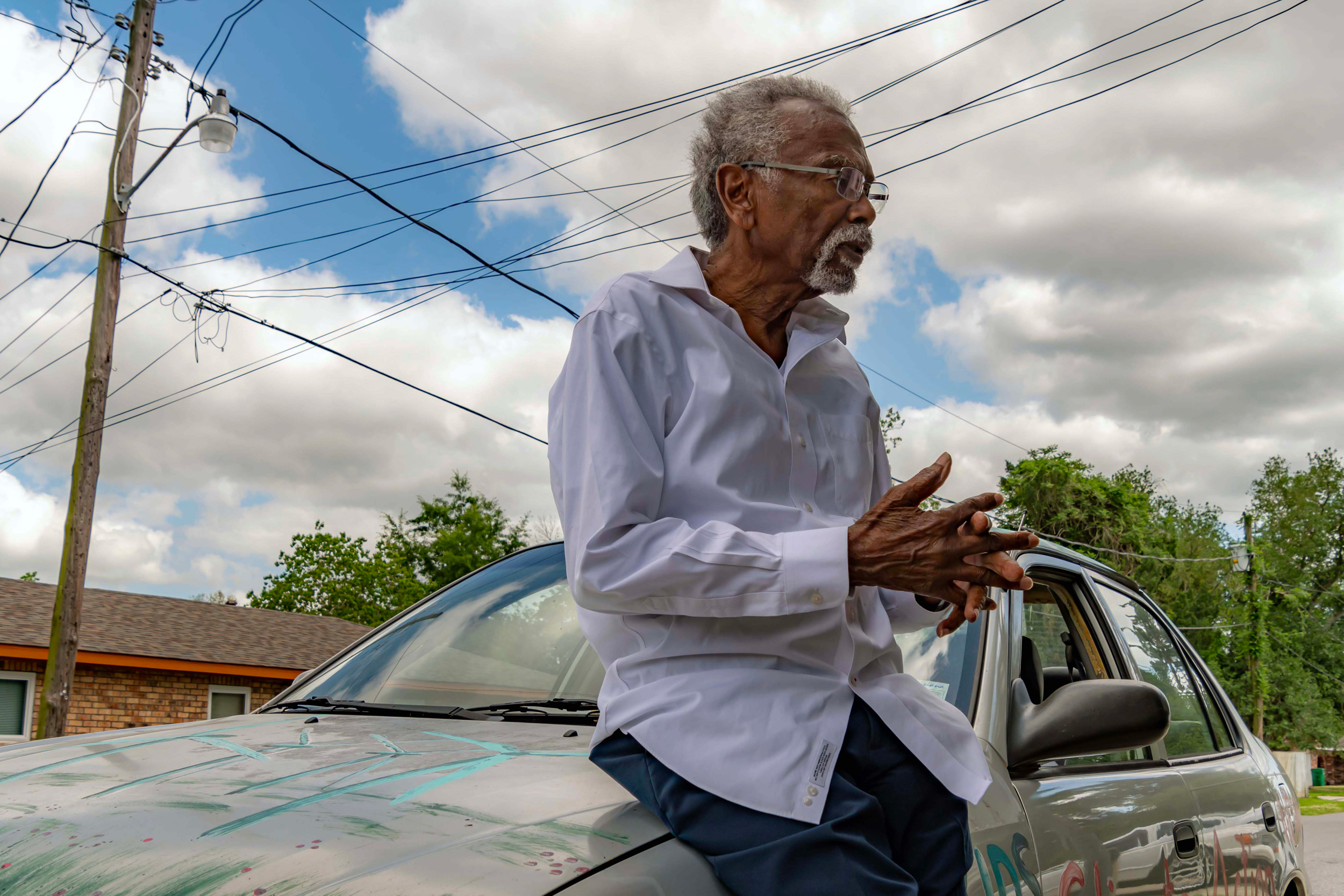 Robert Taylor stands outside his home, which is near a neoprene factory in Reserve, La. Credit: Lee Hedgepeth/Inside Climate News