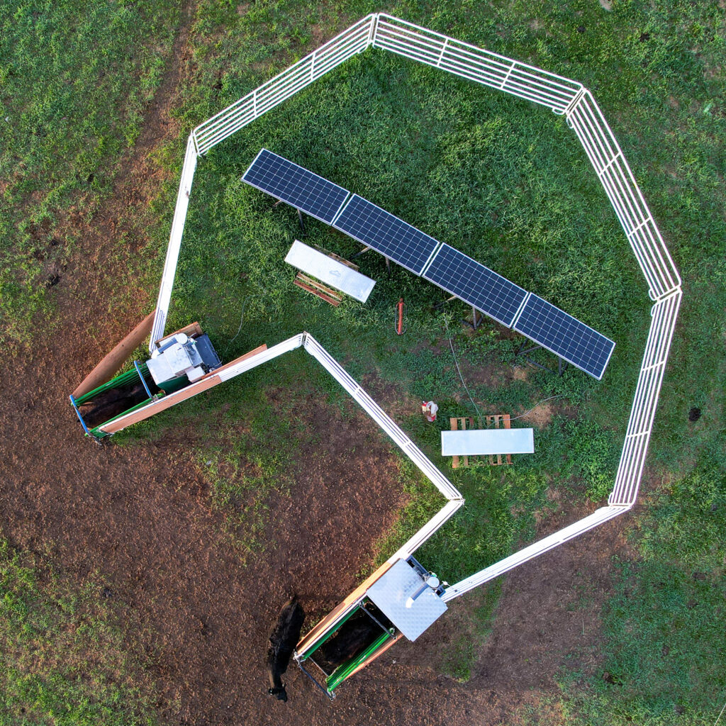 An aerial view of machines that dispense a seaweed supplement and measure the grazing cattle’s methane emissions. Credit: Paulo de Méo Filho/UC Davis