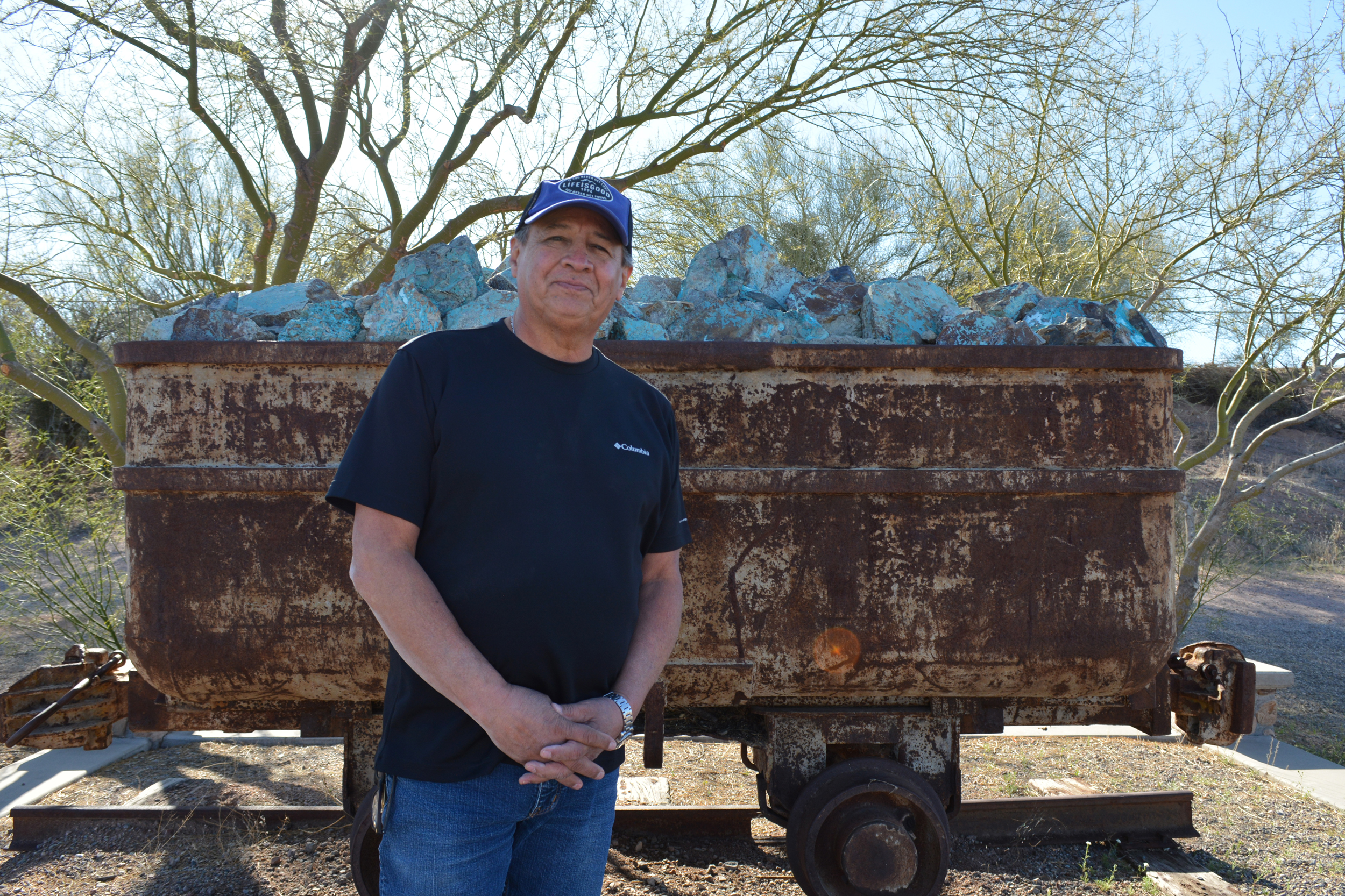 Hector Denogean Sr. stands the Mammoth Miners Memorial in Southern Arizona. Denogean says he can’t support a new mine that may take more water out of the drying region. Credit: Wyatt Myskow/Inside Climate News
