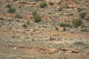 An abandoned oil well sits on a hillside on Tribal land near Farmington, N.M. Credit: Jerry Redfern/Capital & Main