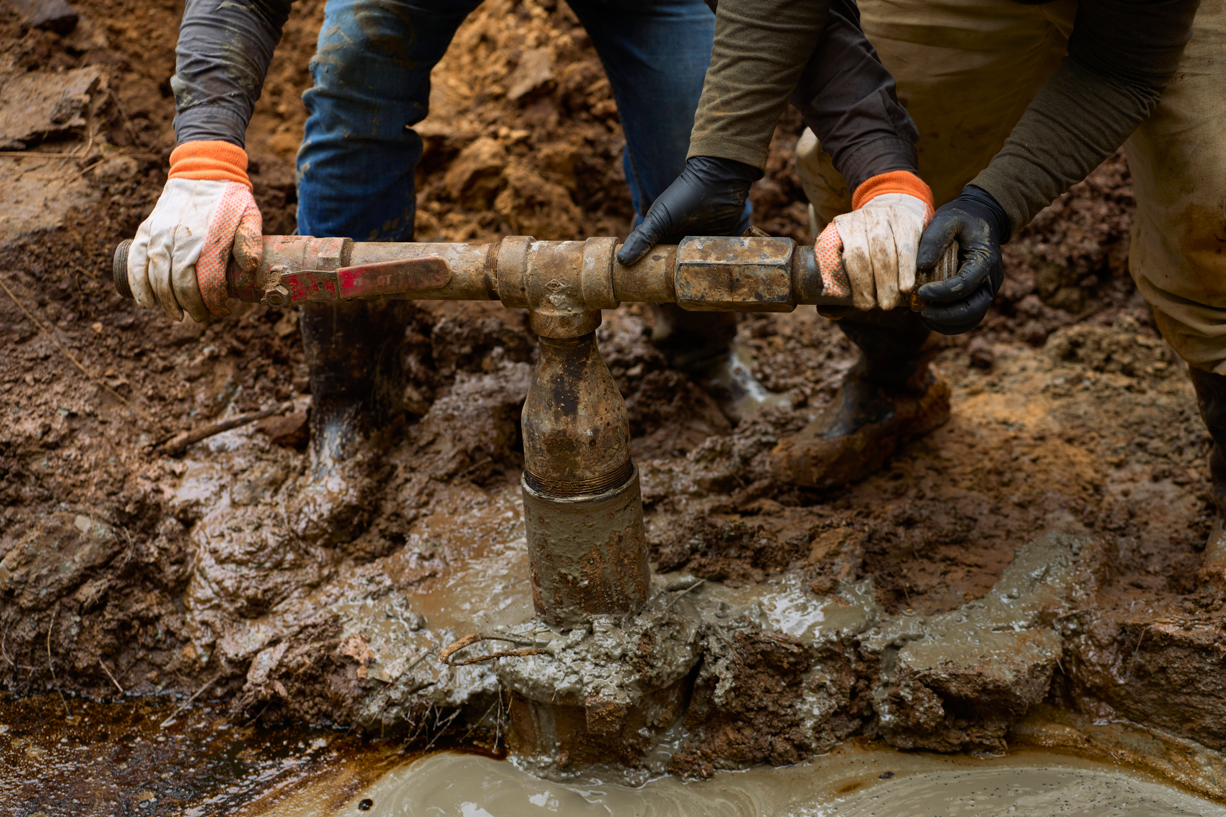 Workers cap an orphaned well near Oil City, La. on March 8, 2023. Credit: Cooper Neill for The Washington Post via Getty Images