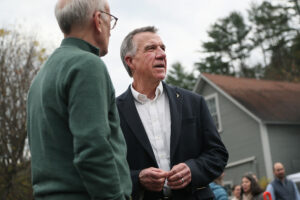 Gov. Phil Scott cited a lack of charging stations and a freeze of millions of dollars in federal funding for chargers in Vermont as part of the reason for the order. Credit: Suzanne Kreiter/The Boston Globe via Getty Images