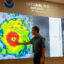 John Cangialosi, senior hurricane specialist at NOAA’s National Hurricane Center, inspects a satellite image of Hurricane Beryl on July 1, 2024, in Miami. Credit: Joe Raedle/Getty Images