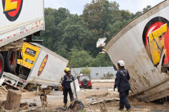 Members of the FEMA Urban Search and Rescue Task Force search a flood damaged area in the aftermath of Hurricane Helene on Oct. 4, 2024 in Asheville, N.C. Credit: Mario Tama/Getty Images