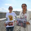 Human rights attorney Alejandra Gonza (right) stands with Brenda Díaz Valencia, who is holding a photo of her father, Antonio Díaz Valencia, and his colleague Ricardo Arturo Lagunes Gasca, in Washington, D.C. on Oct. 3, 2024. The two men disappeared after criticizing mining practices in Mexico. Credit: Richard Pierrin/AFP via Getty Images
