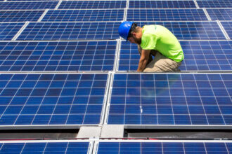 A solar array is installed at an apartment complex in Charlotte, N.C. Credit: Logan Cyrus/The Washington Post via Getty Images