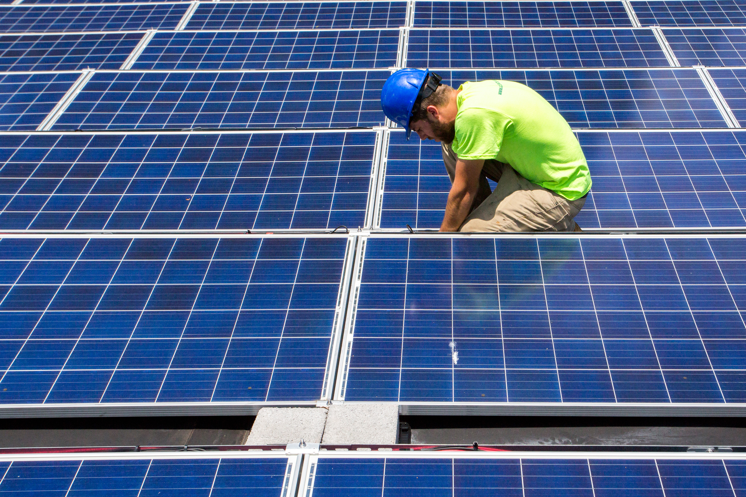 A solar array is installed at an apartment complex in Charlotte, N.C. Credit: Logan Cyrus/The Washington Post via Getty Images