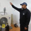 Jackie Robinson, lead instructor at the Energy Coordinating Agency, shows off a heat pump in his Philadelphia laboratory on April 22. Robinson and other instructors prepare hundreds of students each year for careers in HVAC and energy efficiency. Credit: Kyle Bagenstose/Inside Climate News