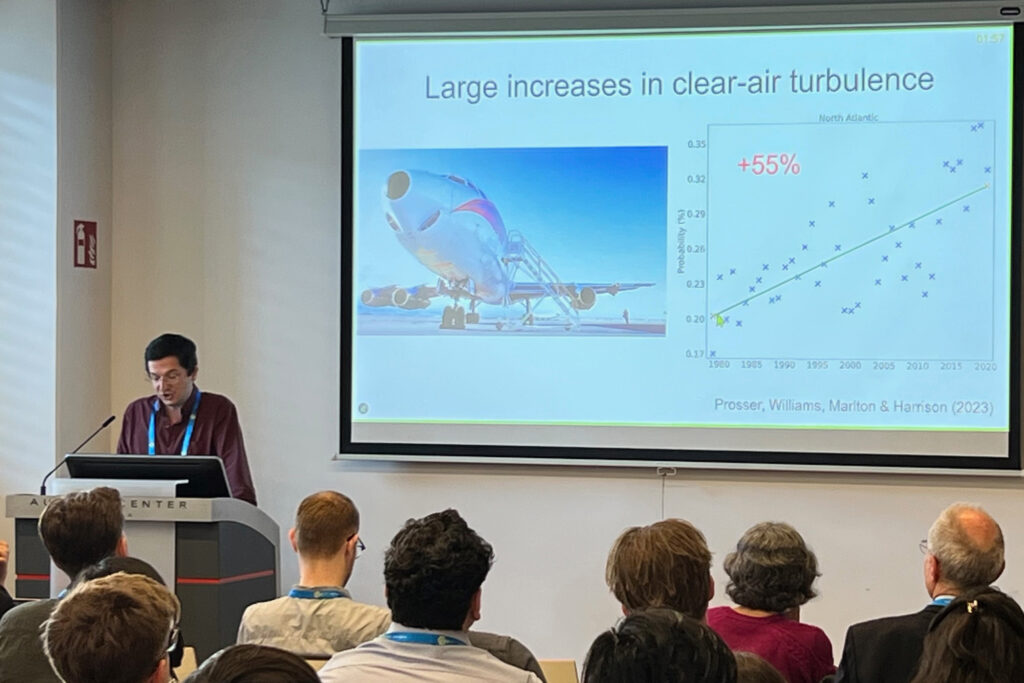 Paul Williams, a professor of atmospheric science and head of the weather research division at the University of Reading, makes a presentation during the European Geosciences Union annual conference. Credit: Bob Berwyn/Inside Climate News