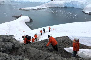 Researchers walk down to the sea at the Argentinean Alimirante Brown Station on the Antarctic Peninsula. Credit: Ted Scambos/Cooperative Institute for Research in Environmental/UC Boulder