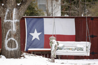 In Fort Worth, Texas, a swinging bench hangs from a tree after a snow storm during Winter Storm Uri in February 2021, when residents went days without electricity and fresh water after a catastrophic failure of the power grid in the state.Credit: Ron Jenkins/Getty Images.