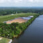 A covered coal ash pond sits adjacent to the Coosa River in Gadsden, Ala. Credit: Courtesy of Coosa Riverkeeper