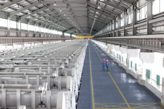 Engineers walk through Emirates Global Aluminum’s Al Taweelah smelter in the United Arab Emirates. Credit: Emirates Global Aluminum