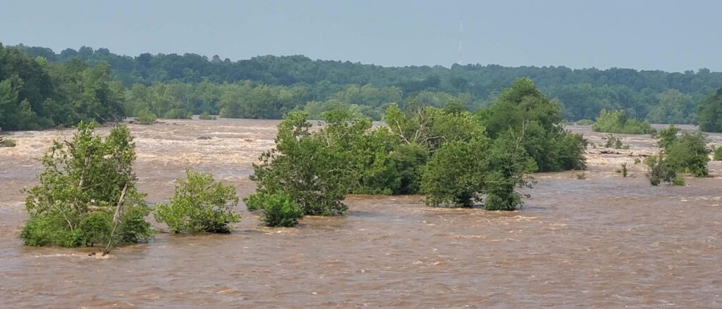 A flooded James River in 2023 Richmond, Va. Credit: Sean Sublette