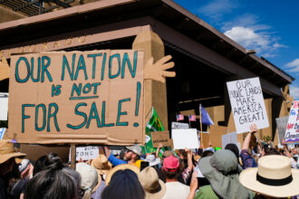 Protesters gather outside of the Western Governors’ Association annual meeting to protest threats to the nation’s public lands on June 23 in Santa Fe, N.M. Credit: New Mexico Wild