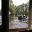The FEMA task force staffers are in a small inflatable boat, viewed through a window