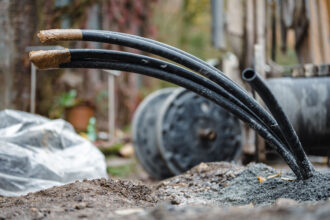 A draft budget bill would eliminate the residential clean energy credit that helps offset that cost of installing geothermal heating and cooling systems. Credit: Marius Becker/picture alliance via Getty Images