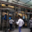 People enter the JPMorgan Chase headquarters in New York City. The American bank is a top financial supporter of fossil fuel companies globally. Credit: Michael Nagle/Xinhua via Getty Images