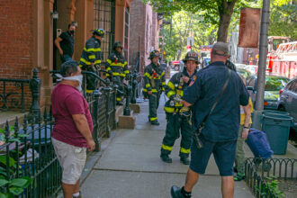Firefighters with the New York City Fire Department investigate a possible natural gas leak at an apartment building in Brooklyn on July 14, 2020. Credit: Robert Nickelsberg/Getty Images