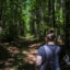 Allyson Gray, of the Pamunkey Indian Tribe, strolls the land called Dragon Run, swampy land that was inhabited by indigenous groups who fled persecution in the early days of American colonialism on Aug. 23, 2024, near Center Cross, Va. Credit: Jahi Chikwendiu/The Washington Post via Getty Images