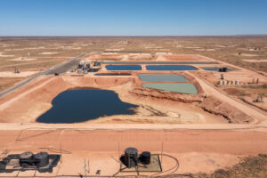 Evaporation ponds hold produced water amid the oil wells of the Permian Basin in Loco Hills, N.M. Credit: Jim West/UCG/Universal Images Group via Getty Images