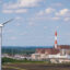 An aerial view of Constellation Energy’s nuclear power plant with a wind power turbine in the foreground near Marseilles, Ill. Credit: Scott Olson/Getty Images