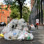 Recycling and garbage bags line the curb in Brooklyn, New York City. Credit: Lauren Dalban/Inside Climate News
