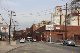 People cross a street in an industrial area of Newark’s Ironbound neighborhood. Credit: Paul Sableman/CC BY 2.0