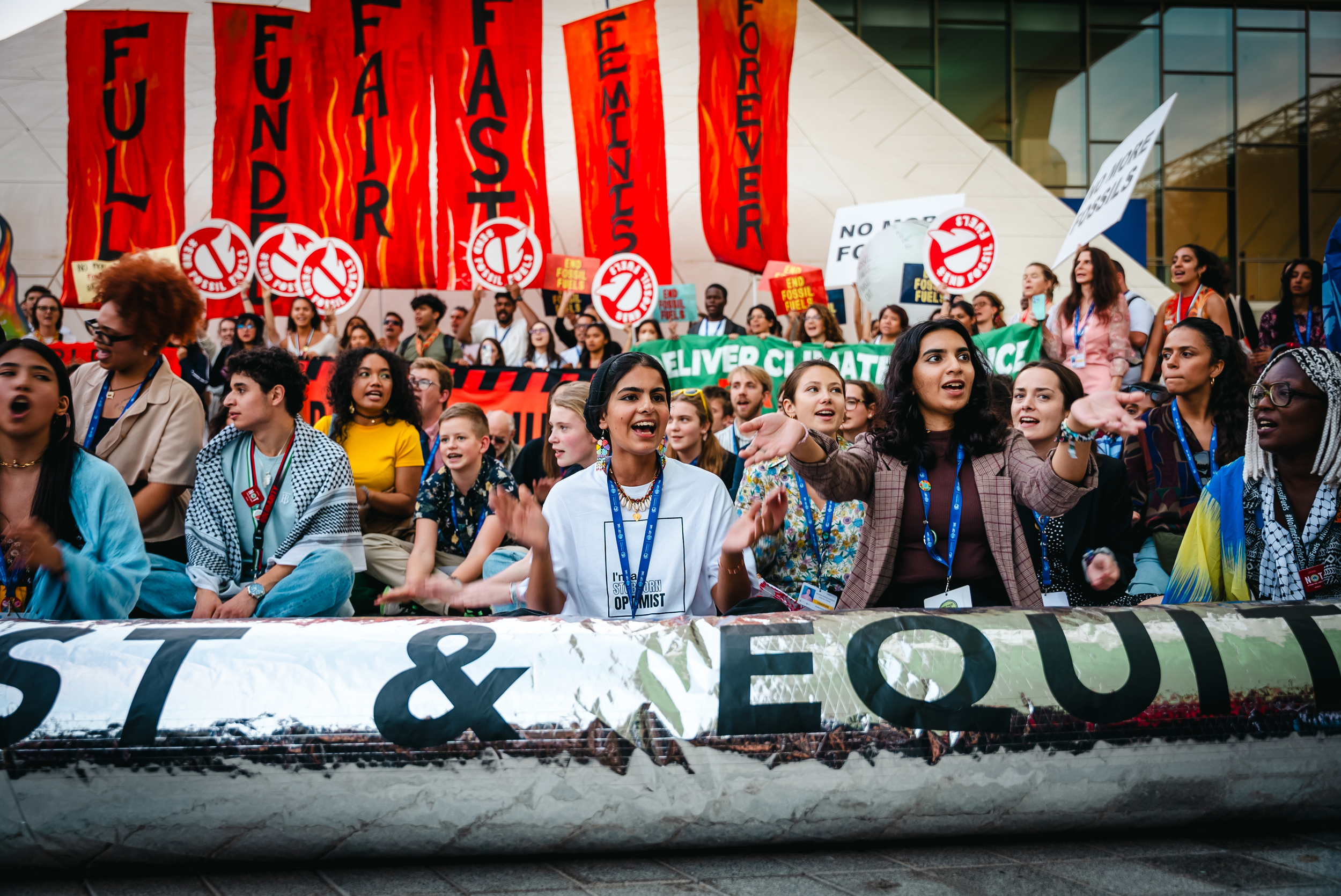 Ayshka Najib (second from right), a climate activist based in the United Arab Emirates, protests at the United Nations climate summit in Dubai, UAE, in 2023. Credit: Courtesy of Ayshka Najib