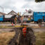 A construction crew completes a lead service line replacement at a Chicago home in June 2023. Credit: Vanessa Bly/NRDC