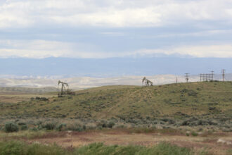 Pumpjacks operate on public land leased to oil and gas developers in Wyoming. Credit: BLM Wyoming
