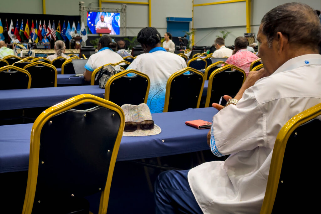 SolTuna manager Adrian Wickham listens to Pacific island nation leaders discuss how climate change is affecting key tuna stocks during the Honiara Summit in the Solomon Islands. Credit: Nathan Eagle/Civil Beat