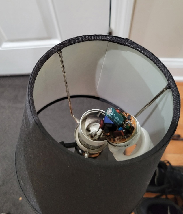 The April 7 power surge shattered a compact fluorescent lightbulb in a resident’s home. Credit: Courtesy