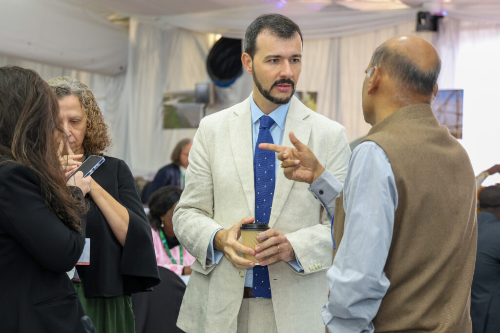 Brazilian delegate Patrick Luna (center) attends COP15 on July 28 in Victoria Falls, Zimbabwe. Credit: Convention on Wetlands